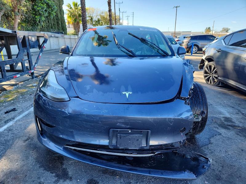Photo 5 from auction – 2023 TESLA MODEL 3 with VIN 5YJ3E1EAXPF458372