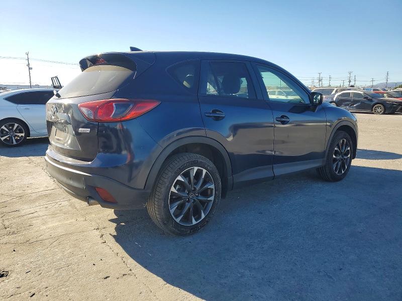 Photo 3 from auction – 2016 MAZDA CX-5 GT with VIN JM3KE2DY1G0654156