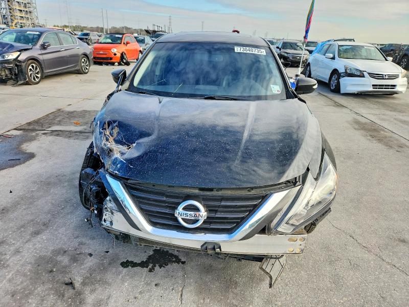 Photo 5 from auction – 2016 NISSAN ALTIMA with VIN 1N4BL3APXGC142271