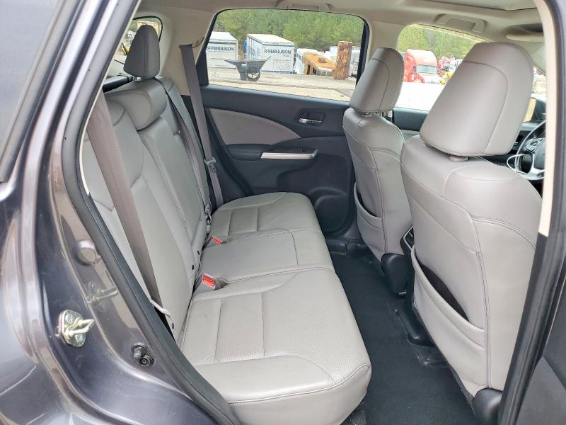 Photo 11 from auction – 2016 HONDA CR-V with VIN 2HKRM3H71GH541392