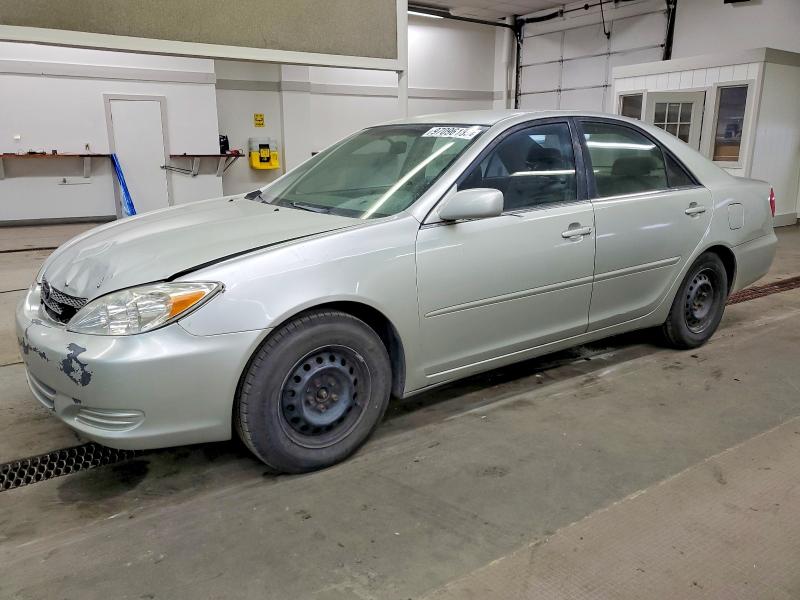 TOYOTA CAMRY LE 2002 with VIN JTDBE32K020135332 - Photo from auction