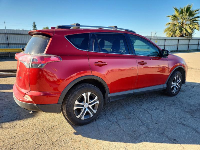 Photo 3 from auction – 2017 TOYOTA RAV4 LE with VIN JTMZFREV1HJ147822