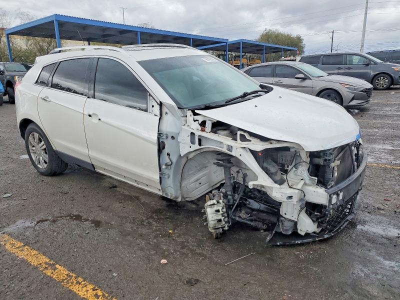 Photo 4 from auction – 2015 CADILLAC SRX with VIN 3GYFNBE39FS634025