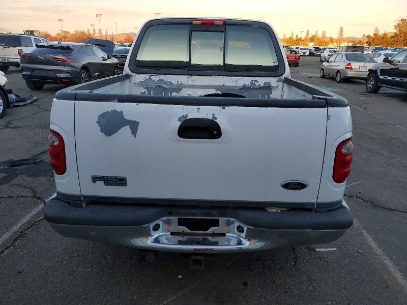 Photo 6 from auction – 2003 FORD F150 with VIN 1FTRW07693KA74297