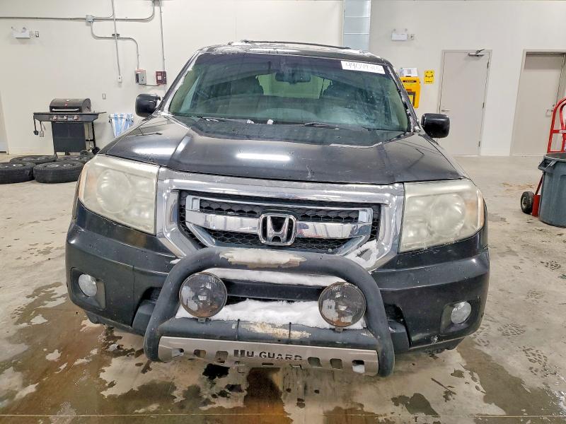 Photo 5 from auction – 2009 HONDA PILOT TOUR with VIN 5FNYF48939B504035