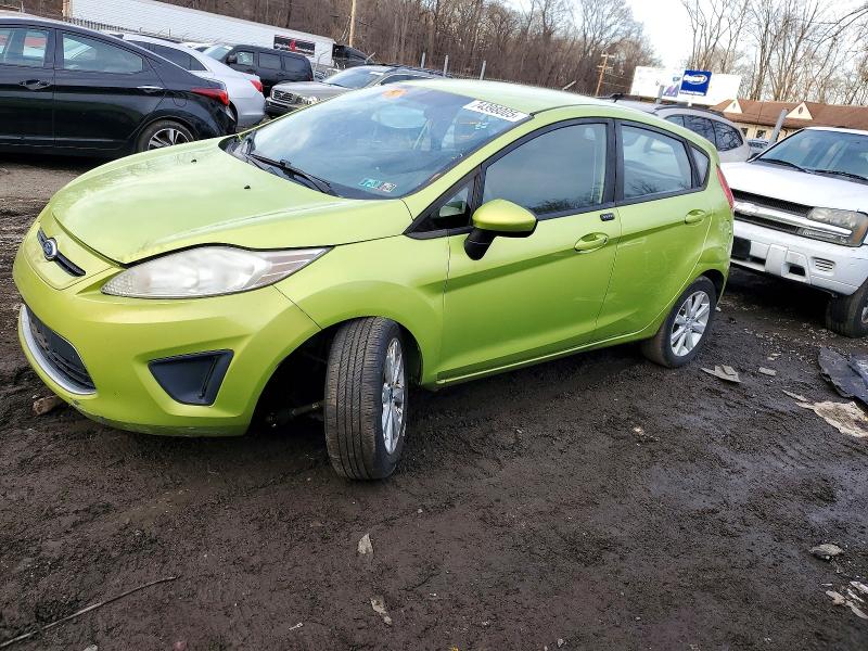 FORD FIESTA SE 2011 with VIN 3FADP4EJ3BM153273 - Photo from auction