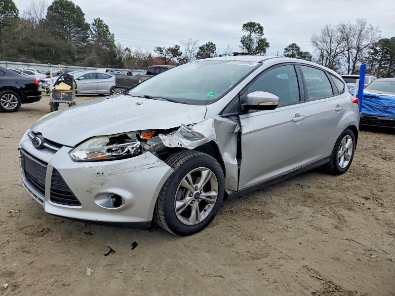 FORD FOCUS SE 2014 with VIN 1FADP3K2XEL103354 - Photo from auction