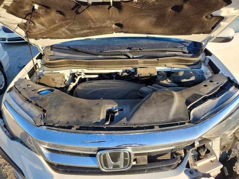 Photo 12 from auction – 2021 HONDA PILOT TOUR with VIN 5FNYF5H6XMB007021