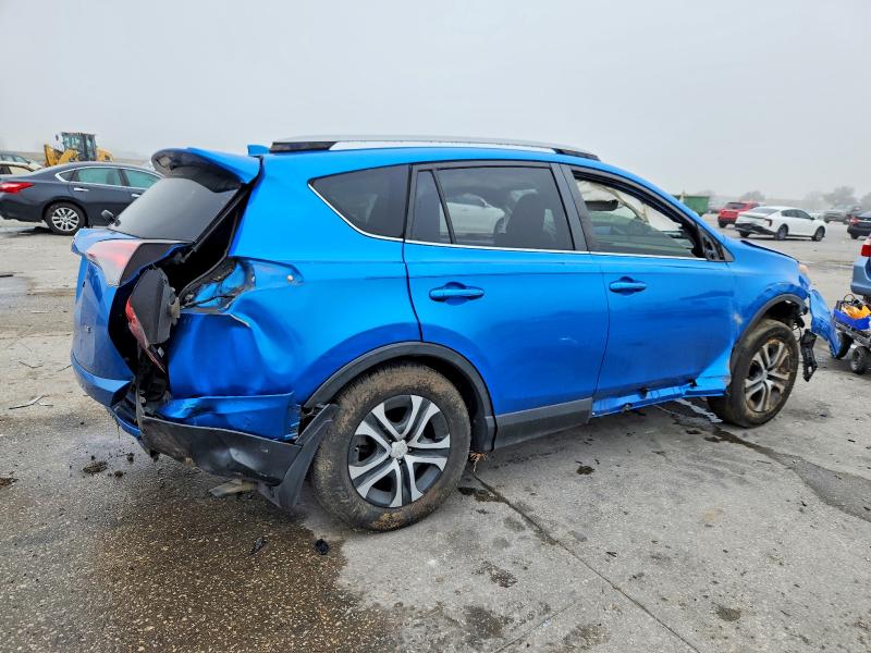 Photo 3 from auction – 2018 TOYOTA RAV4 LE with VIN JTMZFREV2JJ190488