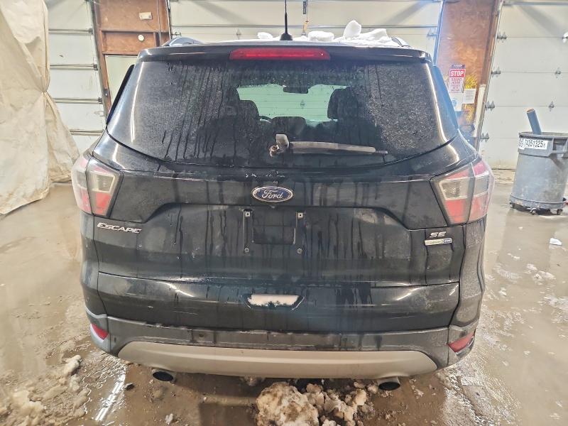 Photo 6 from auction – 2017 FORD ESCAPE SE with VIN 1FMCU9GD2HUB34300