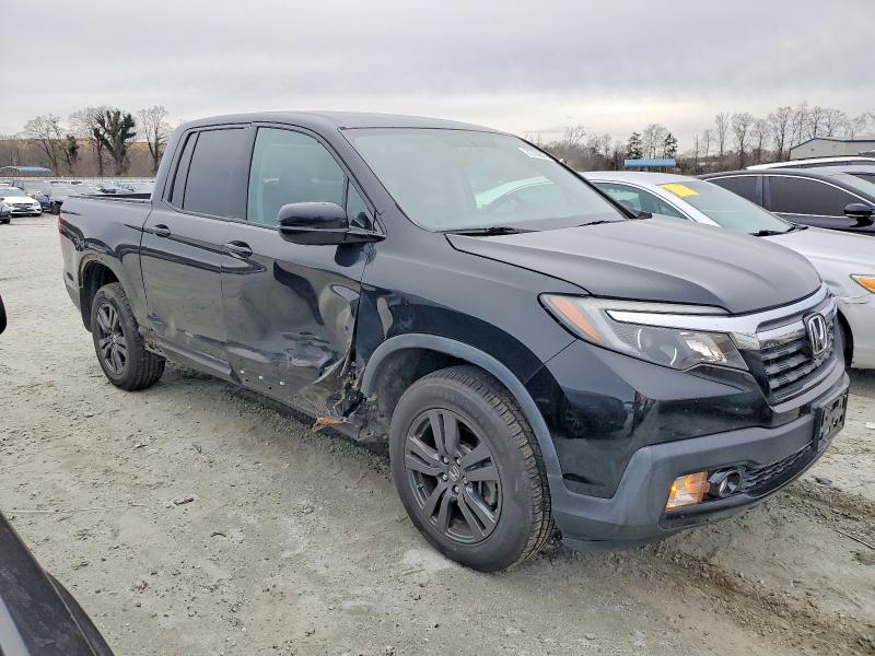Photo 4 from auction – 2018 HONDA RIDGELINE with VIN 5FPYK3F15JB016266