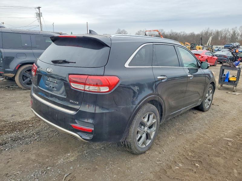 Photo 3 from auction – 2016 KIA SORENTO SX with VIN 5XYPKDA56GG004133