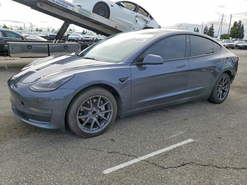 TESLA MODEL 3 2023 with VIN 5YJ3E1EAXPF599457 - Photo from auction