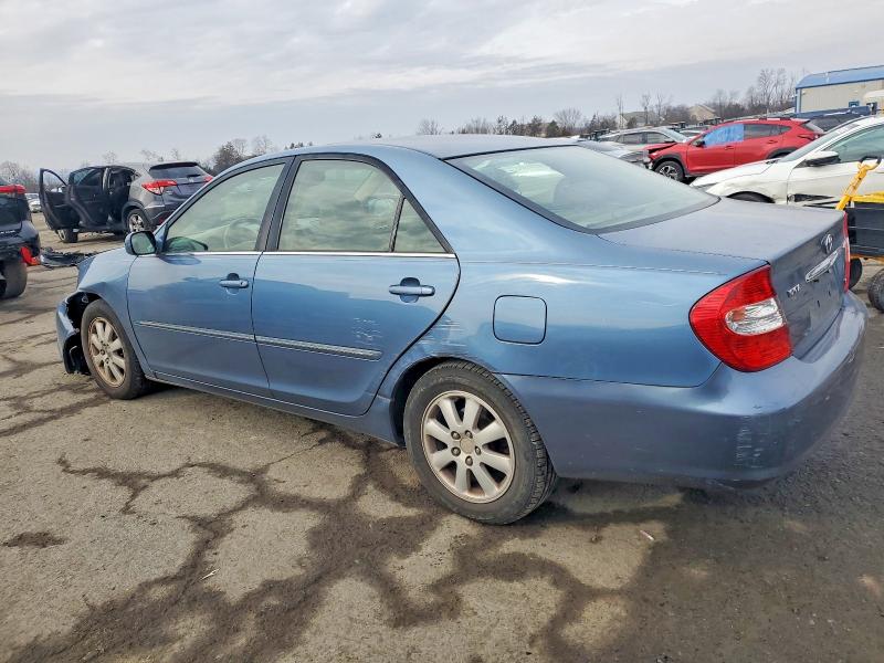 Photo 2 from auction – 2002 TOYOTA CAMRY LE with VIN 4T1BF30KX2U541428