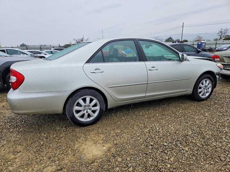 Photo 3 from auction – 2002 TOYOTA CAMRY LE with VIN JTDBE30K320056403