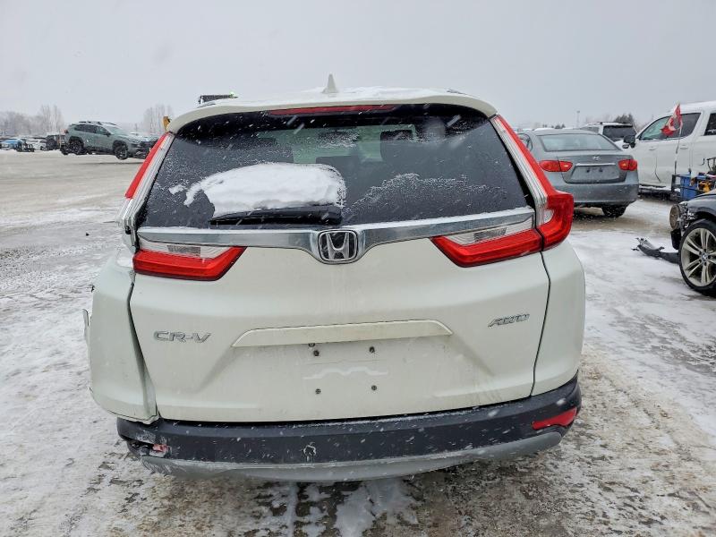 Photo 6 from auction – 2017 HONDA CR-V EX with VIN 2HKRW2H50HH119361