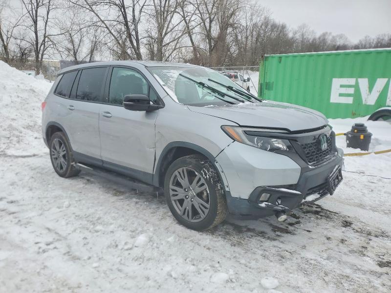 Photo 4 from auction – 2021 HONDA PASSPORT E with VIN 5FNYF8H58MB014302