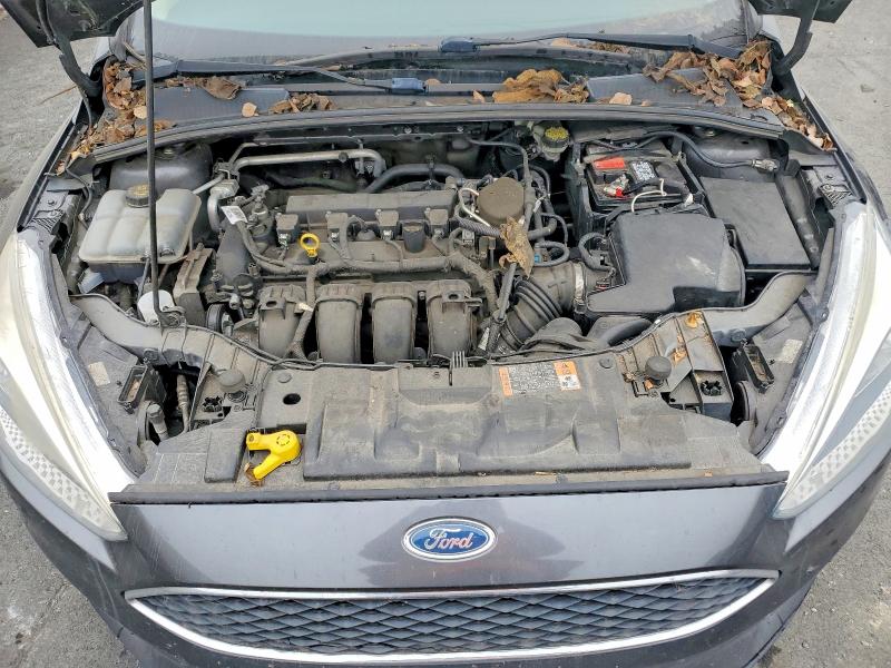 Photo 11 from auction – 2016 FORD FOCUS with VIN 1FADP3E29GL230577