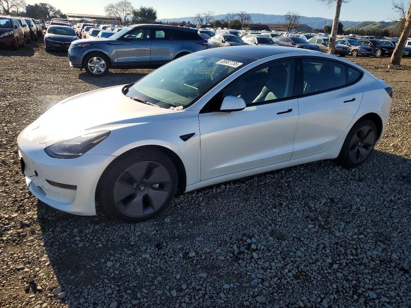 TESLA MODEL 3 2023 with VIN 5YJ3E1EA6PF497475 - Photo from auction
