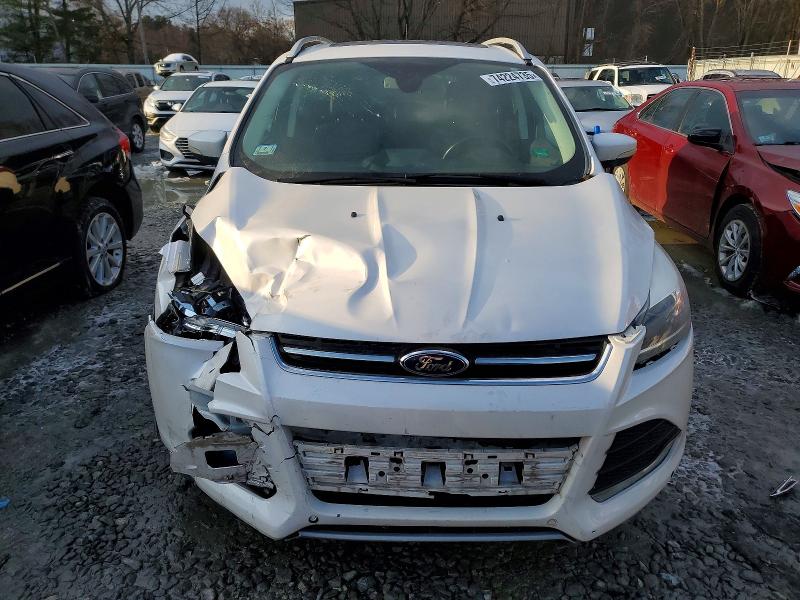 Photo 5 from auction – 2014 FORD ESCAPE TIT with VIN 1FMCU9J93EUD12764