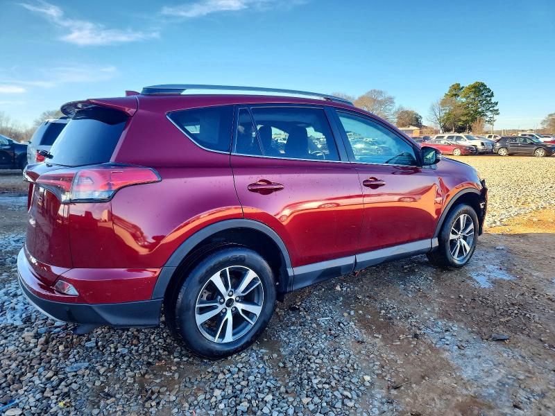 Photo 3 from auction – 2018 TOYOTA RAV4 with VIN 2T3WFREV9JW424940