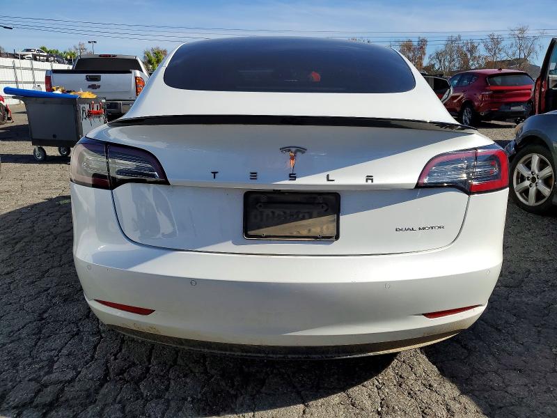 Photo 6 from auction – 2021 TESLA MODEL 3 with VIN 5YJ3E1EB0MF879103