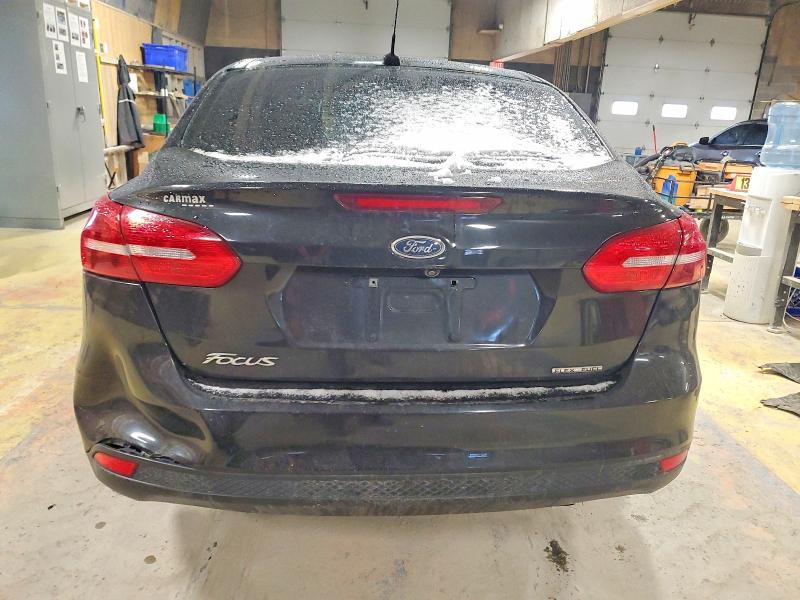 Photo 6 from auction – 2015 FORD FOCUS S with VIN 1FADP3E21FL268514