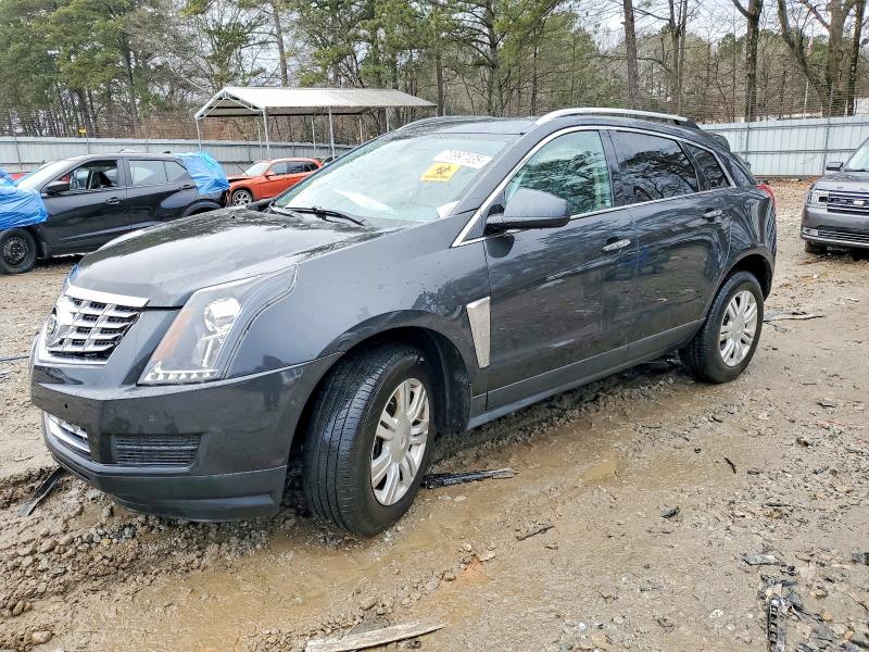 CADILLAC SRX 2015 with VIN 3GYFNBE32FS636991 - Photo from auction