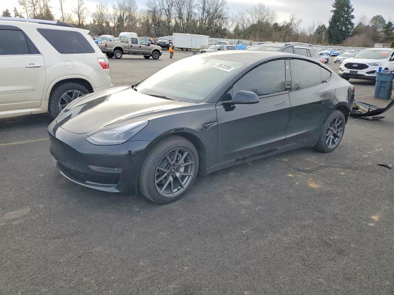 TESLA MODEL 3 2023 with VIN 5YJ3E1EA6PF707394 - Photo from auction