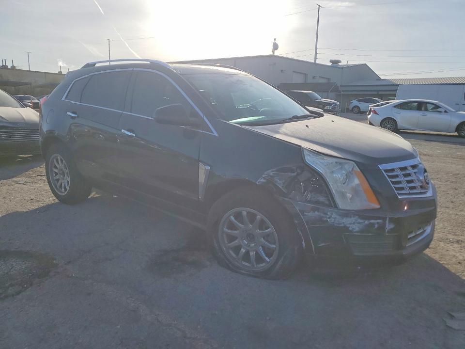 Photo 4 from auction – 2014 CADILLAC SRX with VIN 3GYFNBE33ES659856