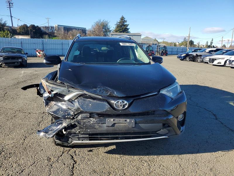 Photo 5 from auction – 2016 TOYOTA RAV4 XLE with VIN 2T3RFREV2GW510354