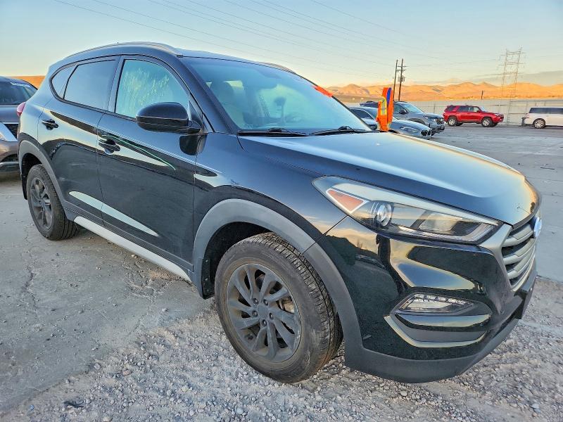 Photo 4 from auction – 2017 HYUNDAI TUCSON LIM with VIN KM8J3CA45HU594535