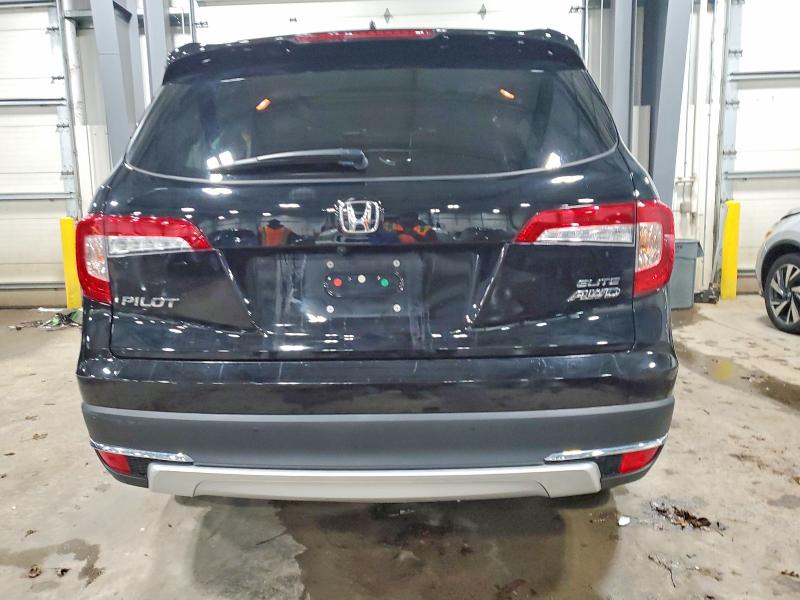 Photo 6 from auction – 2021 HONDA PILOT ELIT with VIN 5FNYF6H09MB032784