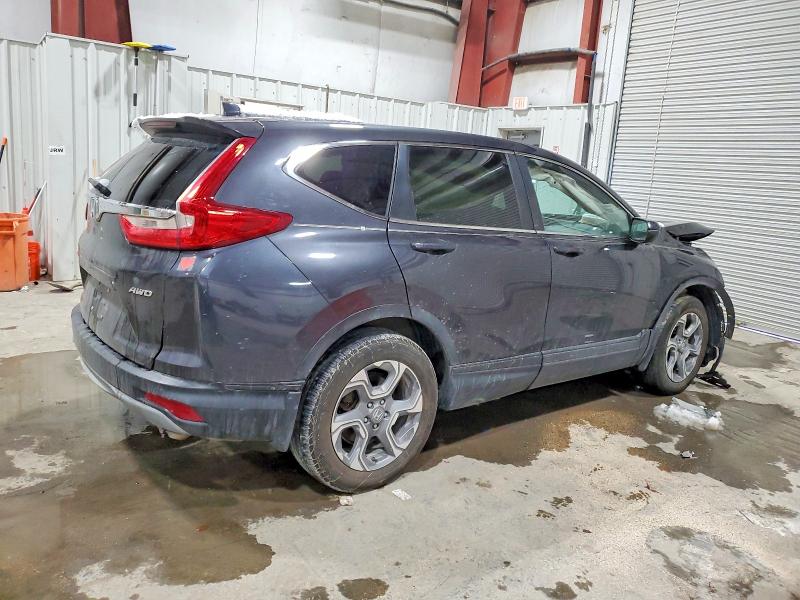 Photo 3 from auction – 2018 HONDA CR-V with VIN 7FARW2H59JE021258
