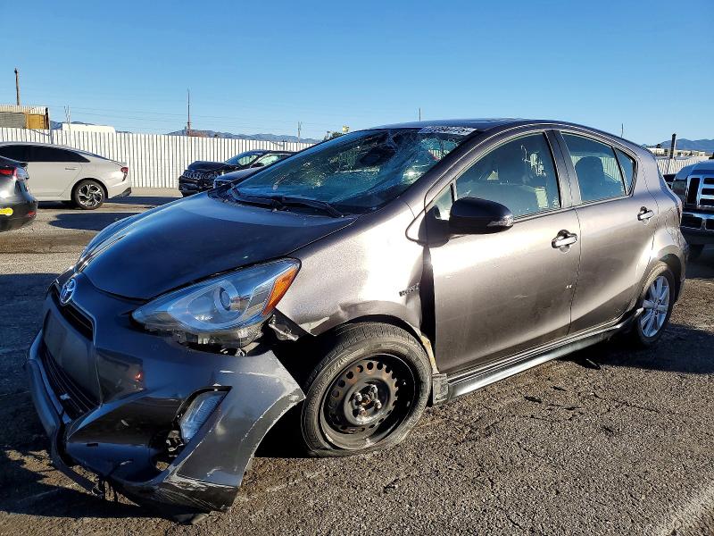 TOYOTA PRIUS C 2017 with VIN JTDKDTB33H1593249 - Photo from auction