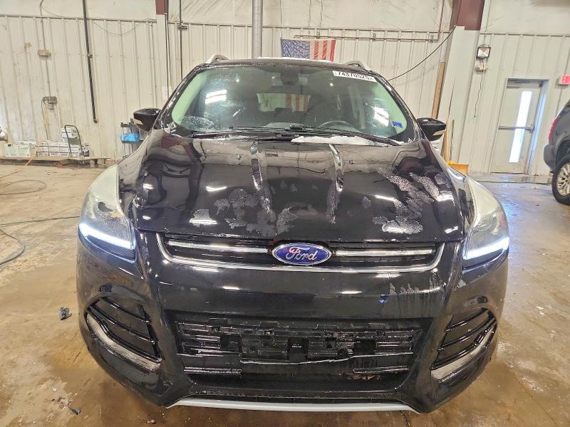 Photo 5 from auction – 2016 FORD ESCAPE TIT with VIN 1FMCU9J97GUC75401