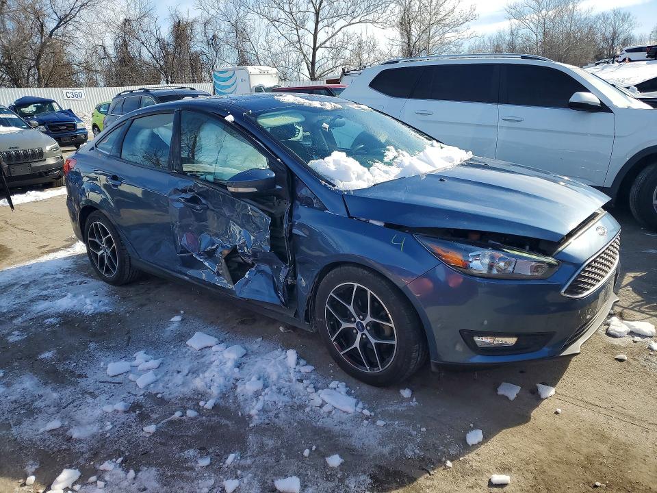 Photo 4 from auction – 2018 FORD FOCUS with VIN 1FADP3H21JL259834