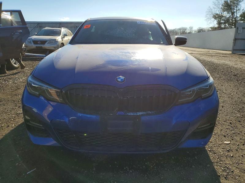 Photo 5 from auction – 2022 BMW 330XI with VIN 3MW5R7J06N8C25648