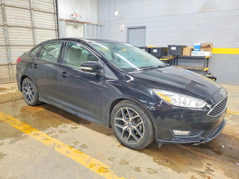 Photo 4 from auction – 2016 FORD FOCUS SE with VIN 1FADP3F22GL274239