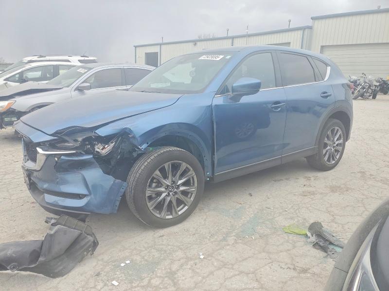 MAZDA CX-5 SIGNA 2021 with VIN JM3KFBEY8M0337630 - Photo from auction