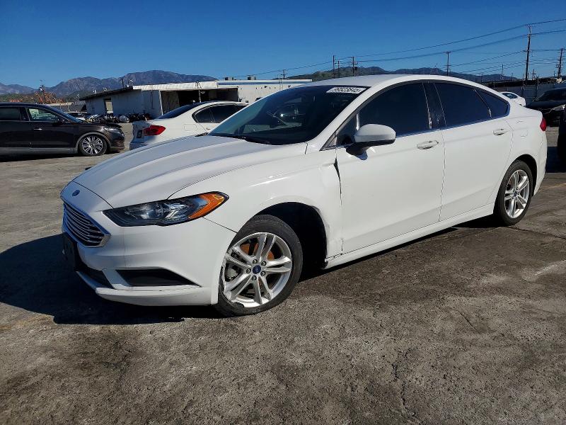 FORD FUSION SE 2018 with VIN 3FA6P0LU4JR127569 - Photo from auction
