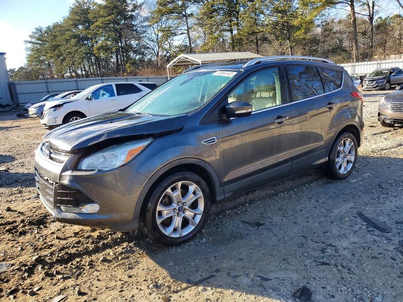 Photo 1 from auction – 2016 FORD ESCAPE TIT with VIN 1FMCU0J98GUB19492