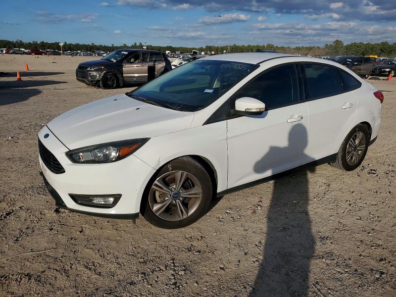 FORD FOCUS 2017 with VIN 1FADP3FE7HL276502 - Photo from auction