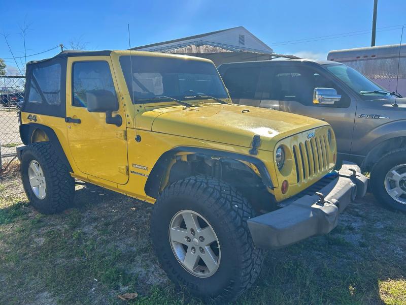 JEEP WRANGLER S 2011 with VIN 1J4AA2D17BL526363 - Photo from auction