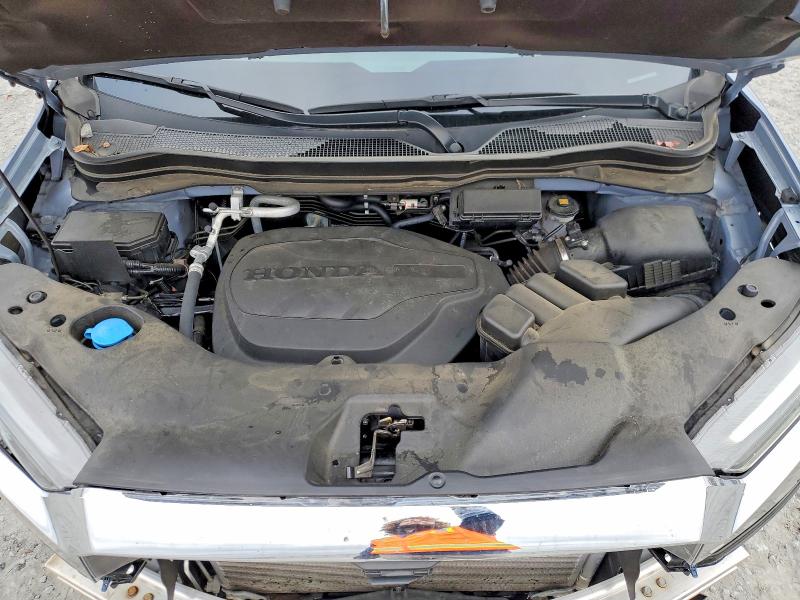Photo 11 from auction – 2023 HONDA PASSPORT E with VIN 5FNYF8H52PB031147