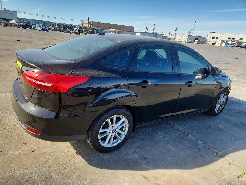 Photo 3 from auction – 2016 FORD FOCUS with VIN 1FADP3F20GL372038