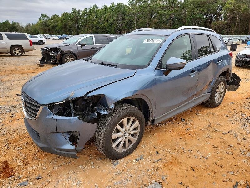 MAZDA CX-5 TOURI 2017 with VIN JM3KE2CY9G0848841 - Photo from auction