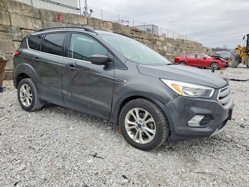 Photo 4 from auction – 2018 FORD ESCAPE with VIN 1FMCU0GD3JUC05134