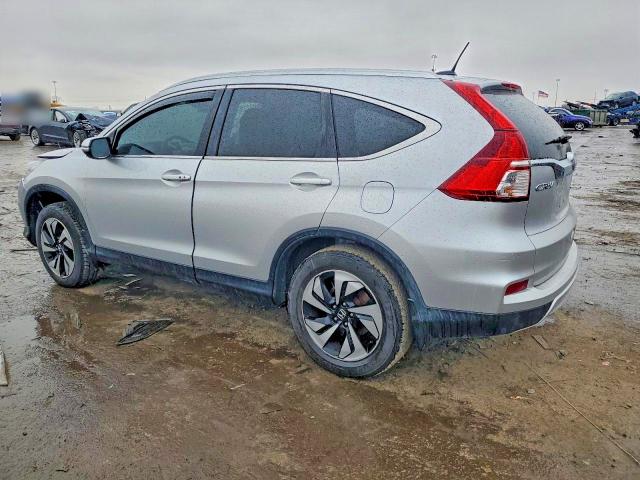 Photo 2 from auction – 2015 HONDA CR-V TOURI with VIN 5J6RM4H90FL025987