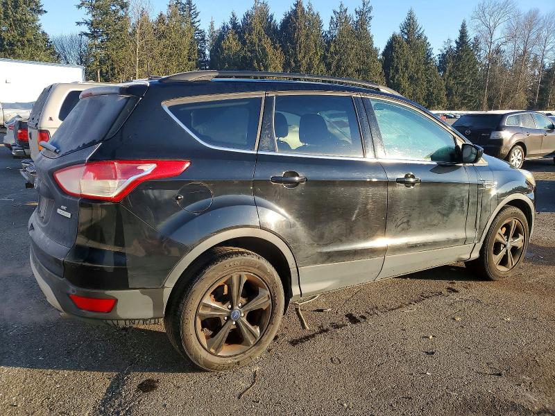 Photo 3 from auction – 2016 FORD ESCAPE SE with VIN 1FMCU0GX6GUA12544